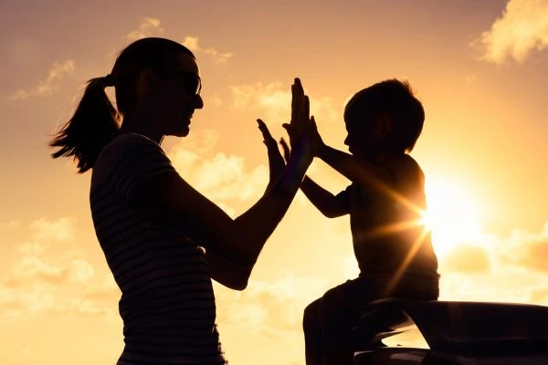 Image of happy mother and child after resolving child arrangements Worthing
